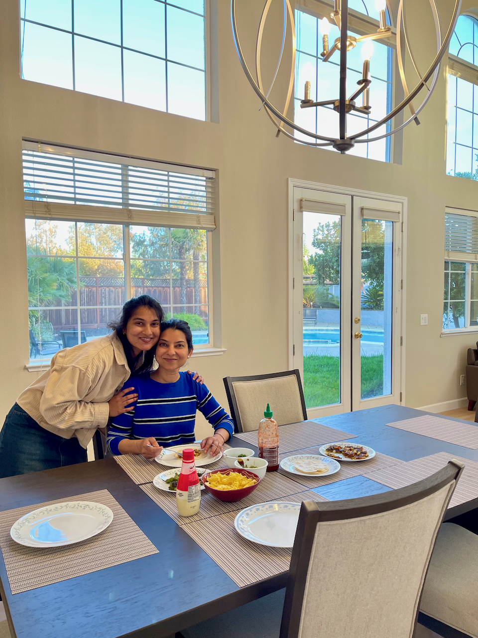 Figure 1: Nidhi enjoying tasty Tacos!