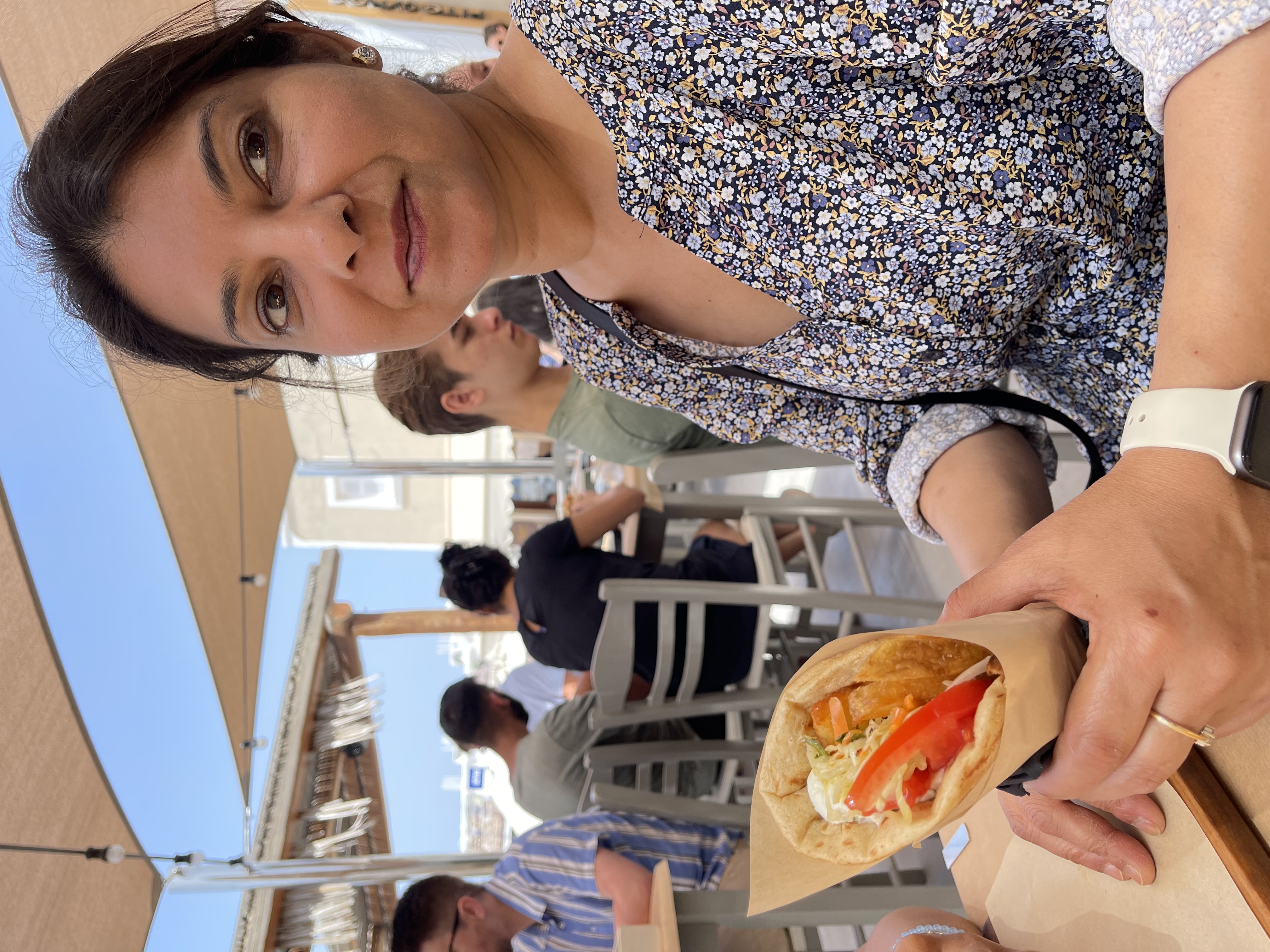 Figure 5: Nidhi Enjoying The Vegetarian Gyro