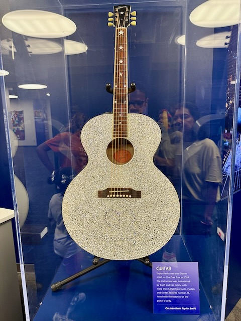 Figure 4: Taylor Swift&rsquo;s ERAs tour guitar with lucky &ldquo;13&rdquo;, Country Music Hall of Fame, Nashville